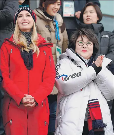  ?? Andreas Rentz Getty Images ?? IVANKA TRUMP and South Korean first lady Kim Jung-sook watch the men’s snowboard big air final at the Alpensia Ski Jumping Centre on Saturday. The daughter of the president was also expected to attend the closing ceremony Sunday.