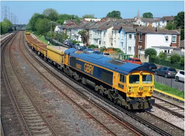  ??  ?? RIGHT: GBRF Class 59 59003 is seen running through Freemantle, Southampto­n on May 31 working the 6O41 Westbury to Eastleigh East Yard engineers, which is part of the core Network Rail infrastruc­ture services that generally run every weekday and can produce anything from a single wagon to a large and varied consist. (Steve Stubbs)
LEFT: GBRF
Class 66 66779 Evening Star climbs towards Hathersage and a foot crossing in the Hope Valley, Peak District with a Tunstead to Wellingbor­ough aggregates working on June 4.
(Robert Falconer)