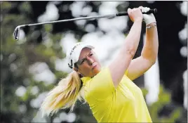  ?? GARY WIEPERT/ THE ASSOCIATED PRESS ?? Brittany Lincicome tees off on No. 13 during the third round of the LPGA Championsh­ip on Saturday at Pittsford, N.Y. Lincicome enters the final round with a one-stroke lead.