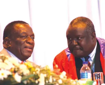  ?? Picture: Justin Mutenda ?? President Emmerson Mnangagwa (left) chats with President of the National Council of Zimbabwe Chiefs, Fortune Charumbira, during a meeting with chiefs in Gweru yesterday