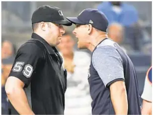  ??  ?? Aaron Boone gets tossed Friday night and pays for it with suspension Sunday. AP