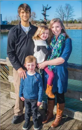  ?? WILLIAM HARVEY/THREE RIVERS EDITION ?? Bryan Duncan, left, stands with his wife, Julie, their son, Drey, and daughter, Allegra. Bryan has a rare liver disease called primary sclerosing cholangiti­s and had to undergo a liver transplant a year ago.