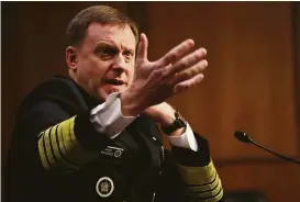  ?? Win McNamee / Getty Images ?? Navy Adm. Michael Rogers testifies before the Senate Armed Services Committee on Tuesday in Washington, D.C.