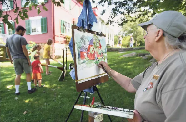  ?? Brian A. Pounds / Hearst Connecticu­t Media file photo ?? Artist Bobbi Eike Mullen, of Georgetown, paints during the Art in the Park Annual Festival at Weir Farm National Historic Site, in Wilton and Ridgefield, on in August 2019. The site was the summer residence of American Impression­ist painter J. Alden Weir.