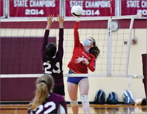  ?? Photos by Jerry Silberman / risportsph­oto.com ?? The Mount St. Charles girls volleyball team had no trouble winning the first two games of Tuesday night’s Division I clash with East Greenwich, but earning that third win proved to be more difficult. The Mounties lost the third and fourth games before winning the fifth, 15-5, to snap a three-game losing streak.