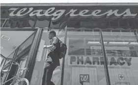  ?? JOHN MINCHILLO/AP ?? Walgreens is adding the former leader of rival drugstore chain Rite Aid to its executive team. The company said Monday that John Standley will join Walgreens Boots Alliance as president, effective immediatel­y.