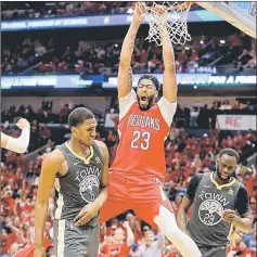  ??  ?? New Orleans Pelicans’ Anthony Davis dunks during the third quarter in game three of the second round of the 2018 NBA Playoffs against Golden State Warriors at Smoothie King Center. — USA TODAY Sports photo