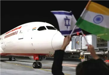  ??  ?? A Boeing 787 flight number AI139 of Indian national carrier Air India, from New Delhi, performs manoeuvres on the tarmac at Ben Gurion Internatio­nal Airport on the outskirts of Tel Aviv after using for the first time Saudi airspace. — AFP photo