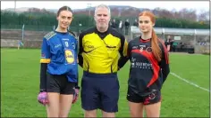  ?? ?? St. Kevin’s CC captain Ella McGrath, match referee Kieron Kenny and Gaelcholái­ste na Mara captain Éadaoin Ní Chatháin.