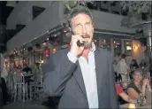  ?? ALAN DIAZ — THE ASSOCIATED PRESS ?? Antivirus software founder John McAfee talks on his mobile phone in Miami Beach, Fla., in 2012.