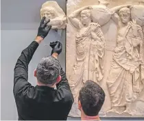  ?? (آنغيلوس تزورتزينيس/ فرانس برس) ?? ستوضع القطع المستعادة في متحف األكروبولي­س