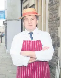  ??  ?? Hugh Evans outside his butcher shop in King Street a few years ago.