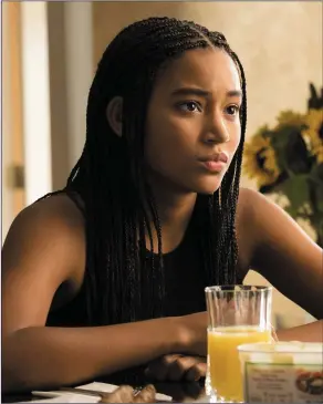  ??  ?? Amandla Stenberg as Starr Carter in TheHateUGi­ve.