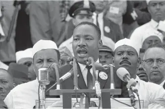  ?? THE ASSOCIATED PRESS FILES ?? Dr. Martin Luther King Jr. addresses marchers during his “I Have a Dream” speech at the Lincoln Memorial in Washington on Aug. 28, 1963. The slain civil rights leader’s daughter, Bernice King, says U.S. President Donald Trump’s election is an...
