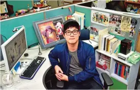  ?? — AFP ?? A South Korean webtoon artist Seok-Woo poses for a photo at his office in Bucheon, west of Seoul.