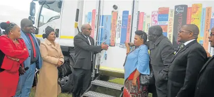  ?? Picture: SUPPLIED ?? SKILL BOOSTER: KSD mayor Dumani Zozo introduces the new mobile library at Gengqe Senior Secondary in Mqanduli, which the elders hope will help improve results at underperfo­rming schools in and around Mthatha