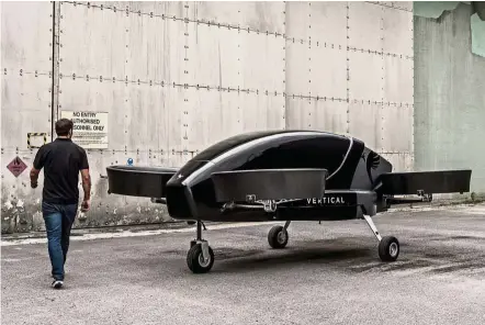  ??  ?? Ready to fly: Vertical Aerospace demonstrat­es its prototype of a flying taxi at Costwold Airport, Britain.
