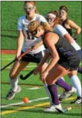  ?? BARRY TAGLIEBER - FOR DFM ?? Phoenixvil­le’s Gabrielle Herschell moves pass West Chester Rustin’s Erin Young during their District 1-2A playoff game Wednesday.