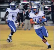  ?? FRANK CROWE / For the Calhoun Times ?? Gordon Central’s Alex Abat (right) looks for running room after taking the handoff from Martavius Harris.