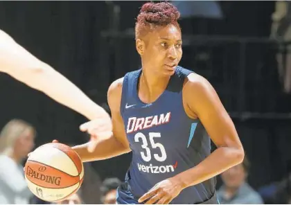  ?? DAVID SHERMAN/GETTY ?? Baltimore native Angel McCoughtry of the Atlanta Dream handles the ball against the Minnesota Lynx on June 29, 2018 in Minneapoli­s.