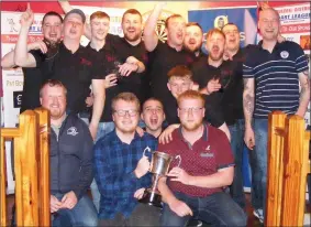  ??  ?? The Thatch C team celebrate after completing the double with victory in the John Speedy Heavey Cup final. Pictures: John McKeown