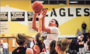  ?? Christian Abraham / Hearst Connecticu­t Media ?? FCIAC Girls’ basketball championsh­ip action between Ridgefield and Staples in Trumbull on Feb. 27.