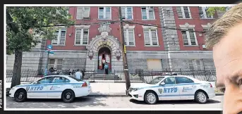  ??  ?? SMART? Mayor de Blasio says “no suspension­s” for kids in K-2, even though a young kid brought a gun to PS 91 in Brooklyn (above) this year.