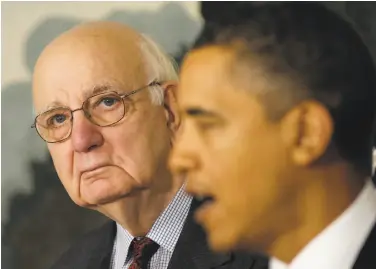  ?? Jim Watson / AFP / Getty Images 2010 ?? Former Federal Reserve chief Paul Volcker (left) listens as President Barack Obama talks of financial reform at the White House in 2010. Now the Federal Reserve may overturn some of those reforms.