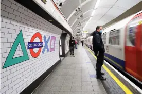  ??  ?? Signs at Oxford Circus undergroun­d station, in London, last November promote the UK launch of PlayStatio­n 5. Photograph: Matt Crossick/PA