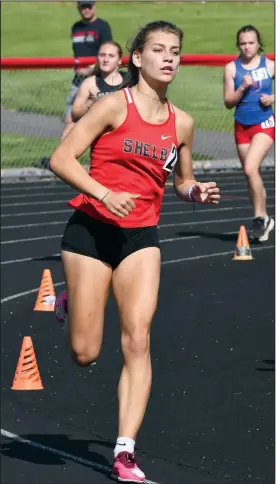  ?? ?? Shelby’s Kayla Gonzales cruises to victory during the MOAC meet Thursday in Marion. (Photo by Chuck Ridenour