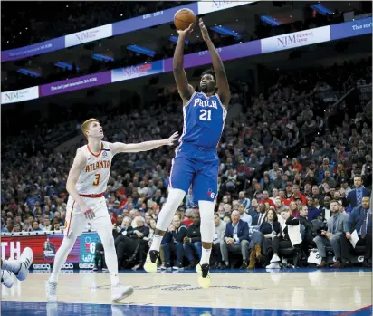  ?? MATT SLOCUM — THE ASSOCIATED PRESS ?? Joel Embiid (21) is among the Sixers players who have performed as expected this season.