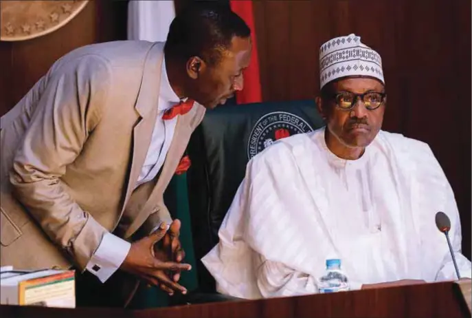  ??  ?? Buhari with Monguno at Federal Executive Council meeting