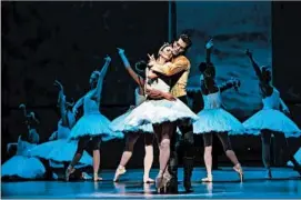  ?? CHERYL MANN PHOTO ?? The Joffrey performed “Swan Lake” in 2014, here with Dylan Gutierrez and Victoria Jaiani.