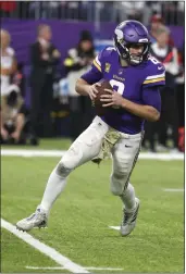 ?? BRUCE KLUCKHOHN — THE ASSOCIATED PRESS ?? Minnesota Vikings quarterbac­k Kirk Cousins looks to pass during the first half against the Dallas Cowboys on Sunday.