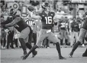  ?? Phelan M. Ebenhack/associated Press ?? Jaguars quarterbac­k Trevor Lawrence passes during the second half of Sunday’s game against the Ravens.