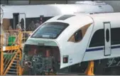  ?? ZHU XINGXIN / CHINA DAILY ?? Workers assemble a train in a factory of CRRC Changchun Railway Vehicles Co in Changchun this month.