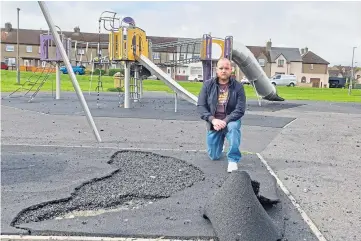  ?? ?? VANDALISED AGAIN: Councillor Darren Watt surveys the damage at the playpark.