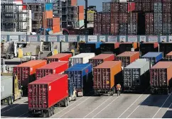  ?? DARRYL DYCK / THE CANADIAN PRESS FILES ?? Canadian exports surged 2.9 per cent from the previous quarter, led by strong gains in energy shipments and internatio­nal sales of consumer goods, StatCan said.