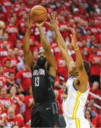  ?? Brett Coomer / Houston Chronicle ?? Although guard James Harden, left, enjoyed a productive offensive night in Monday’s Game 1 with 41 points, the Rockets missed 14 shots from within five feet of the rim and also turned the ball over 16 times against the Warriors.