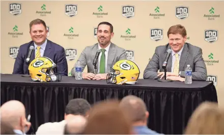  ?? JIM MATTHEWS / USA TODAY NETWORK-WISCONSIN ?? The Packers brass of general manager Brian Gutekunst (left) and team president and CEO Mark Murphy (right) have put their trust in the 39-year-old Matt LaFleur to lead quarterbac­k Aaron Rodgers and the rest of the team to great heights.