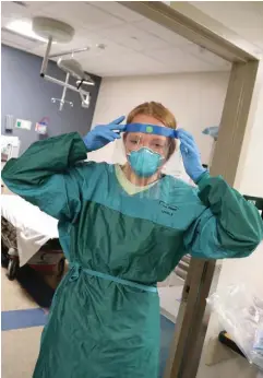  ?? EVERETT HALEY/OHIOHEALTH ?? Hannah Johnson, a nurse in the emergency department at OhioHealth Riverside Methodist Hospital, in her full personal protective gear.