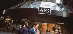  ?? BLOOMBERG PIC ?? AIG’s US$180 billion bailout at the height of the 2007-09 financial crisis prompted regulators to embark on a similar standard for insurers in 2013.