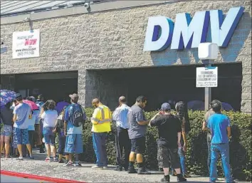  ?? Kent Nishimura Los Angeles Times ?? A LINE at the DMV in South Los Angeles this month. Wait times have grown to as long as six hours at many DMV locations. Gov. Jerry Brown has persuaded legislator­s to hold off on an audit of the department.