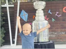  ?? KRISTINA HJERTKVIST — TAMPA BAY LIGHTNING VIA AP ?? Kameron Bush, 3, poses with the Stanley Cup at the Children’s Cancer Center in Tampa, Fla., on Oct. 16.