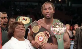  ?? Popperfoto/Getty Images ?? Lennox Lewis poses with his mother, Violet Blake, after defeating Evander Holyfield to unify the undisputed world heavyweigh­t championsh­ip on 13 November 1999. Photograph: