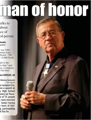  ??  ?? Nikolas Samuels
/The Signal Medal of Honor recipient Col. Jay Vargas gives a speech at Golden Valley High School in Canyon Country on Thursday. He is one of 71 people still alive who have received the medal of honor—having served in two tours of...