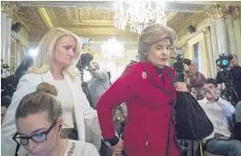  ?? DREW ANGERER/GETTY IMAGES ?? Rocxanne Deschamps, left, and her attorney Gloria Allred arrive for a news conference in New York on Tuesday.