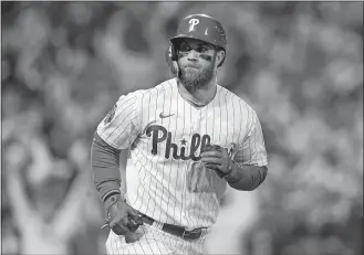  ?? DAVID J. PHILLIP/AP PHOTO ?? In this Nov. 1, 2022, file photo, Philadelph­ia Phillies designated hitter Bryce Harper celebrates his two-run home run during the first inning in Game 3 of the World Series against the Houston Astros in Philadelph­ia.