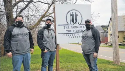  ?? JASON SIMMONDS • THE GUARDIAN ?? The Farmer and The Fisher co-owners, from left, William MacLean, Jeff Noye and Damien Enman, say they are excited to open their new restaurant at the Stanley Bridge Resort.