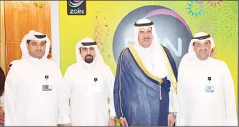  ??  ?? HE Sheikh Salman Al-Homoud Al-Sabah with Zain officials at the company’s boot.